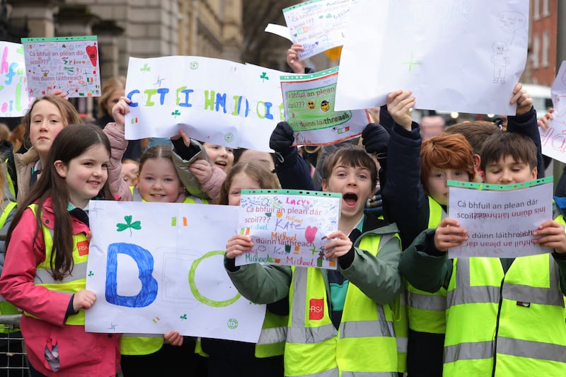 Students from five Gaelscoileanna in Dublin 2, 4, 6 and 8 protest outside Leinster House calling on Minister for Education Hildegarde Naughton to deliver on a promised Gaelcholáiste building. Photograph: Alan Betson/The Irish Times
