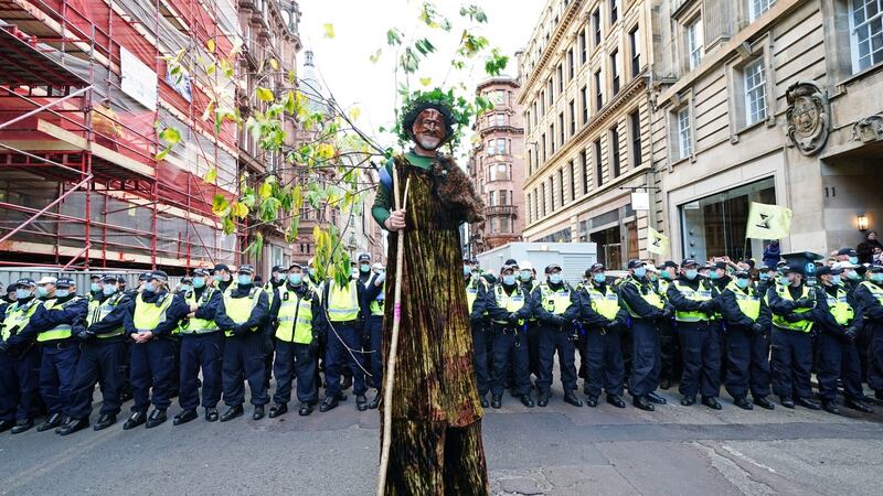 A climate activist known as Stumpy during a Extinction Rebellion protest on St Vincent Street in Glasgow  during the Cop26 summit. Photograph: Jane Barlow/PA Wire