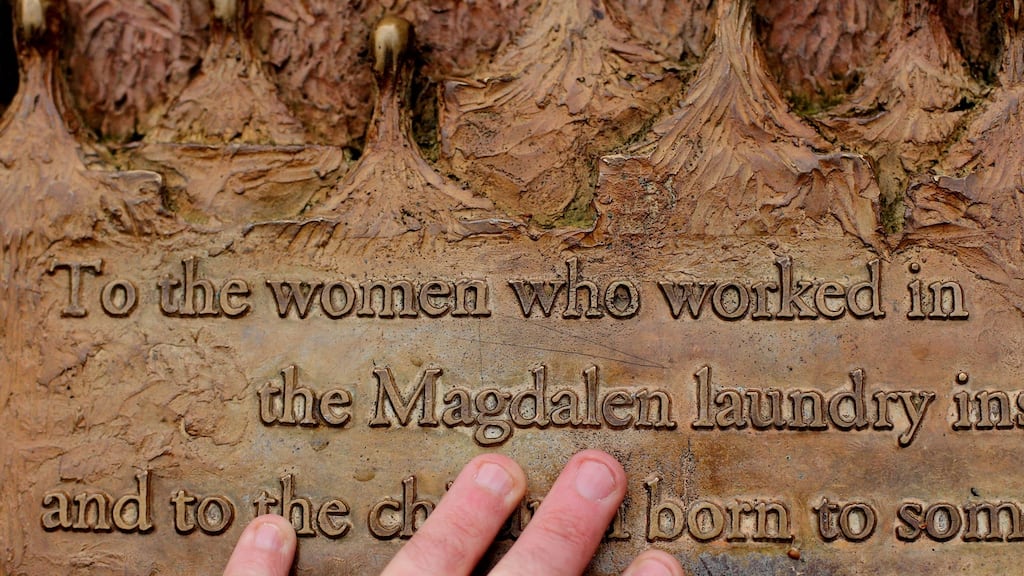 A plaque dedicated to Magdalane Laundry survivors in  St Stephens Green in Dublin. A survivor of one of the Catholic church-run workhouses has been awarded an undisclosed five figure settlement over being forced to work unpaid for almost six years.  Photograph:  Niall Carson/PA Wire.