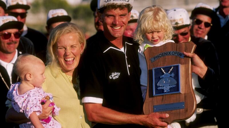 Jesper Parnevik poses with his family after winning the 1998  Phoenix Open at the TPC Scottsdale. Photograph: Craig Jones /Allsport