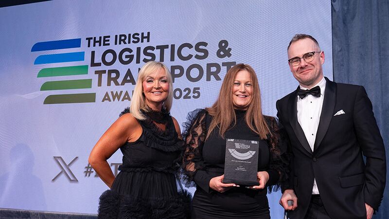 Nikki Mullin, awards judge, presents the diversity and inclusivity award to Linda Allen and Christian Clarke, Bus Éireann.