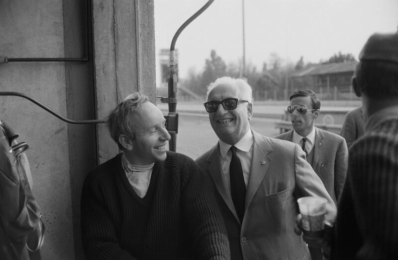 British racing driver John Surtees (left) with Ferrari founder Enzo Ferrari  at Monza in 1966. Photograph: Reg Lancaster/Daily Express/Hulton Archive/Getty Images