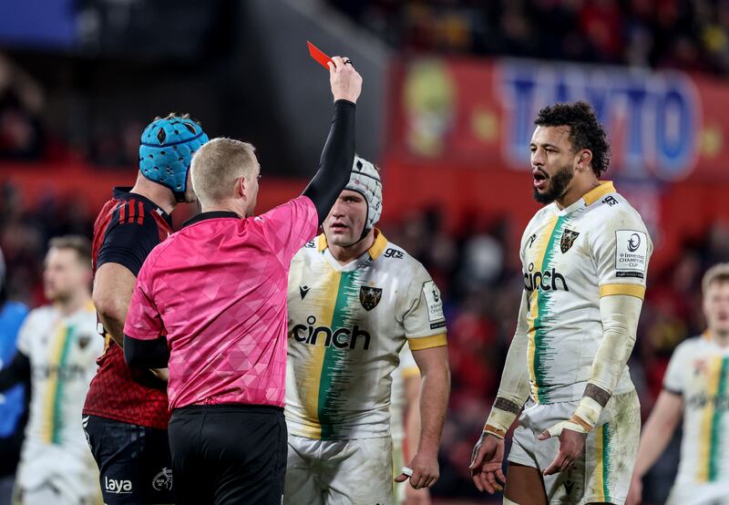 Referee Tual Trainini shows a red card to Curtis Langdon as Courtney Lawes looks on. Photograph: Dan Sheridan/Inpho 
