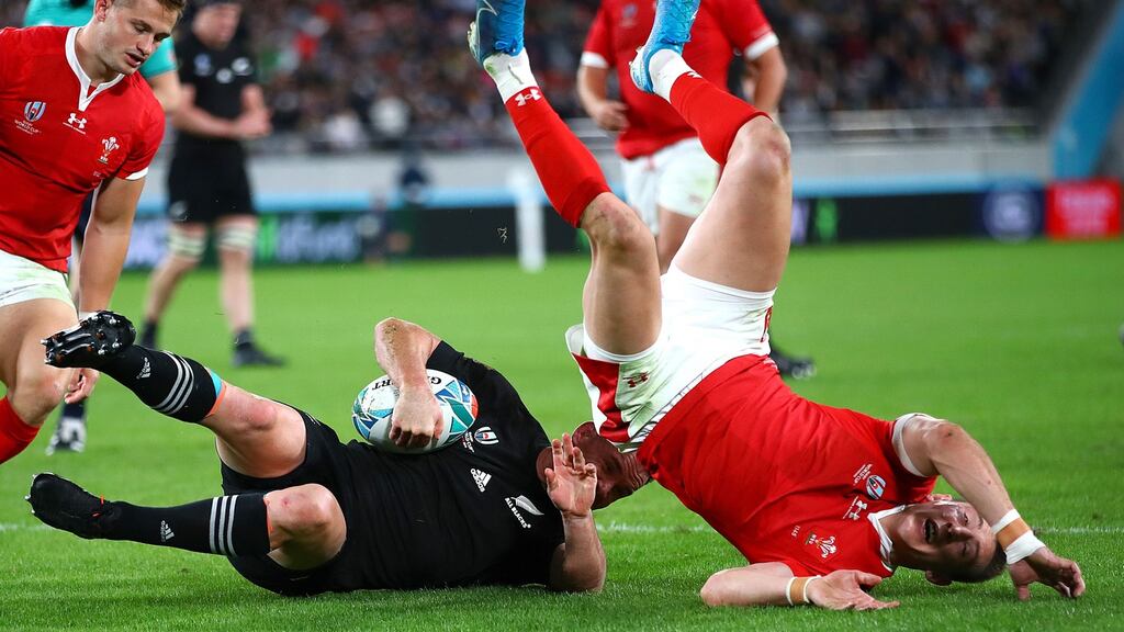 New Zealand’s Ryan Crotty scores their fifth try during the Rugby World Cup third-place playoff against Wales. Photo: James Crombie/Inpho