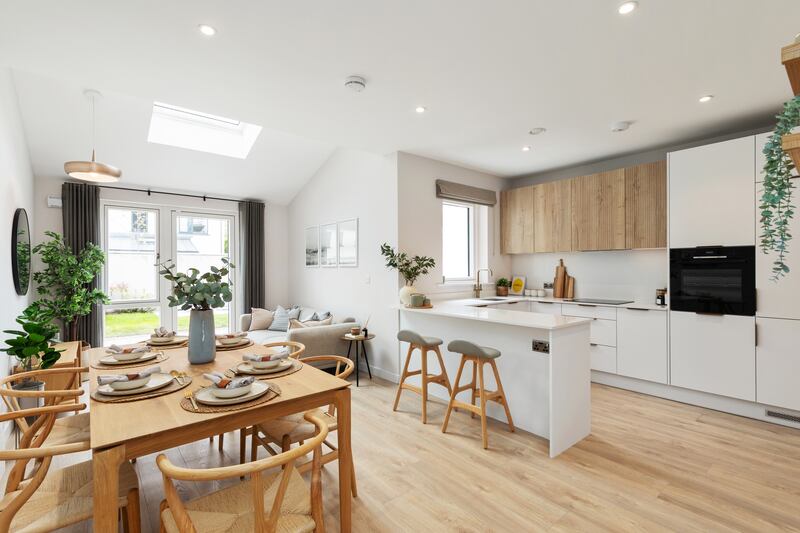 Kitchen/dining/living room in three-bed