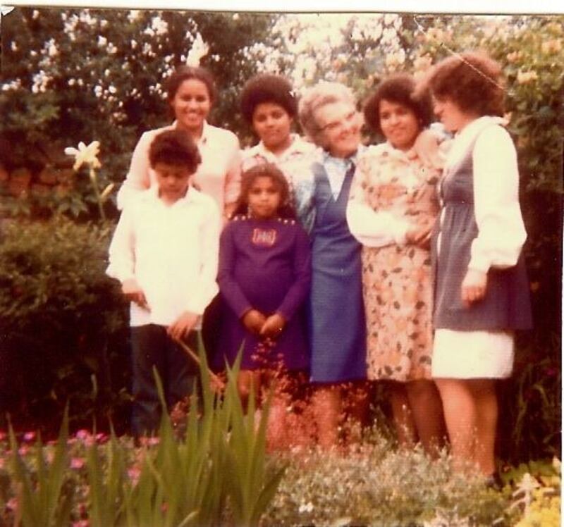 Kit de Waal (back row left) with her siblings, mother Sheila O’Loughlin (far right) and  grandmother  in her back garden in Erasmus Road, Sparkbrook,  a stone’s throw from the Irish Community Centre in Digbeth, which features in The Trick to Time