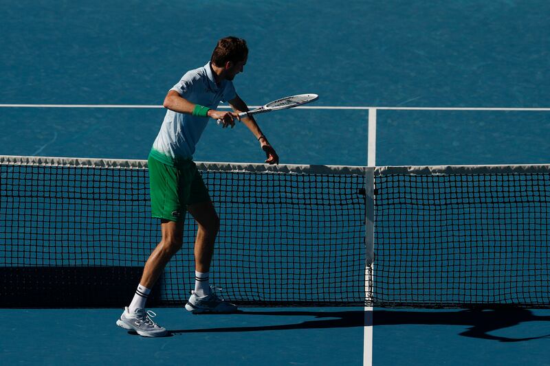 Daniil Medvedev smashes a tv net camera installed on the net with his racket as he has lost the third set against Kasidit Samrej of Thailand in Melbourne. Photograph: Daniel Pockett/Getty Images