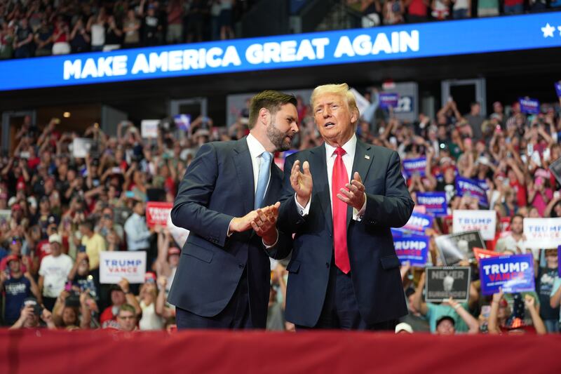 Donald Trump and running mate JD Vance on stage in Grand Rapids, Michigan. Photograph: Doug Mills/The New York Times
                      