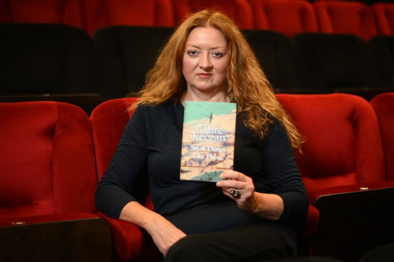 Claire Keegan holds her book Small Things Like These which was nominated for the Booker Prize in 2022. Photograph: Daniel Leal/AFP via Getty Images