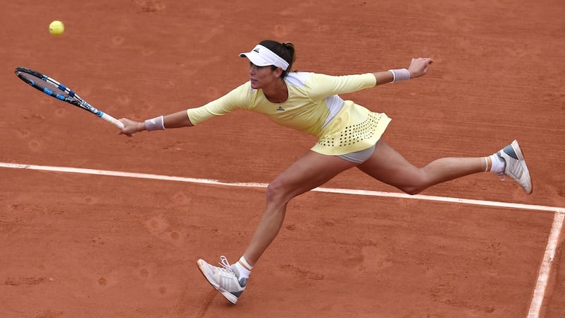 Spain’s Garbine Muguruza returns the ball to Slovakia’s Anna Karolina Schmiedlova during their women’s first round match in the  French Open. Photograph: Eric Feferberg/AFP/Getty Images