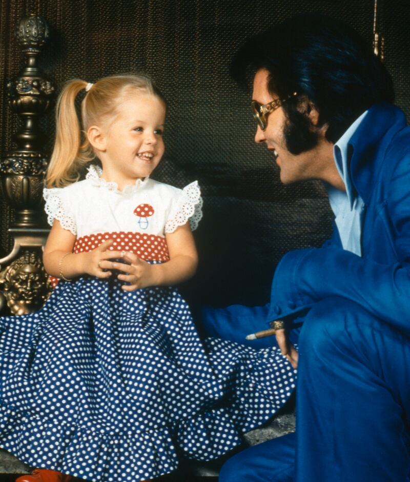 Elvis Presley with his daughter Lisa-Marie Presley. Photograph: Frank Carroll/Sygma via Getty Images