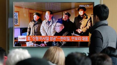 People  in Seoul, South Korea watch a TV news programme showing North Korean leader Kim Jong Un. Photograph: Ahn Young-joon/AP