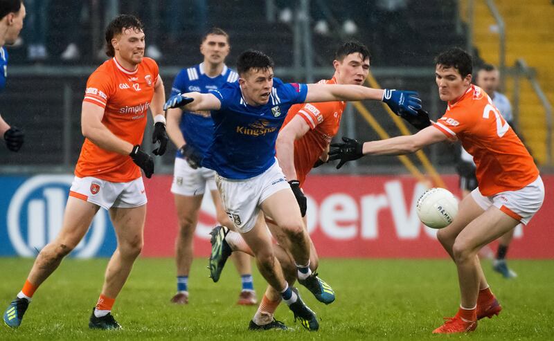 Cavan's Dara McVeety with Armagh's Jason Duffy and Jarly Óg Burns during last year's championshp clash at Kingspan Breffni Park. Photograph: Evan Logan/Inpho  