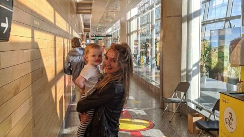 Mary Jane Boland with her daughter at the airport on their way back home to Ireland.
