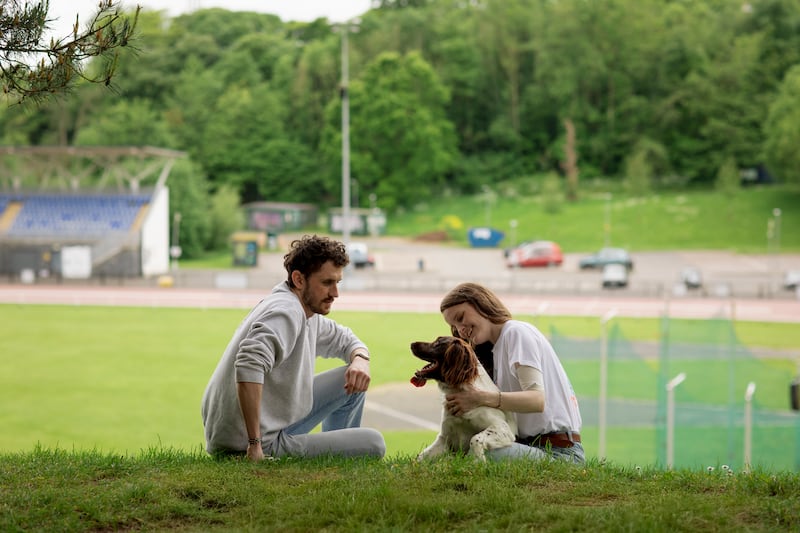 Ciara Mageean with her partner Tommy and her dog Sammy at the Mary Peters Track Photograph: Evanna Devine for The Irish Times