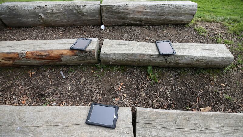 Students’ tablets placed  on benches where outdoor classes are held at Temple Carrig School in Greystones. Photograph: Nick Bradshaw