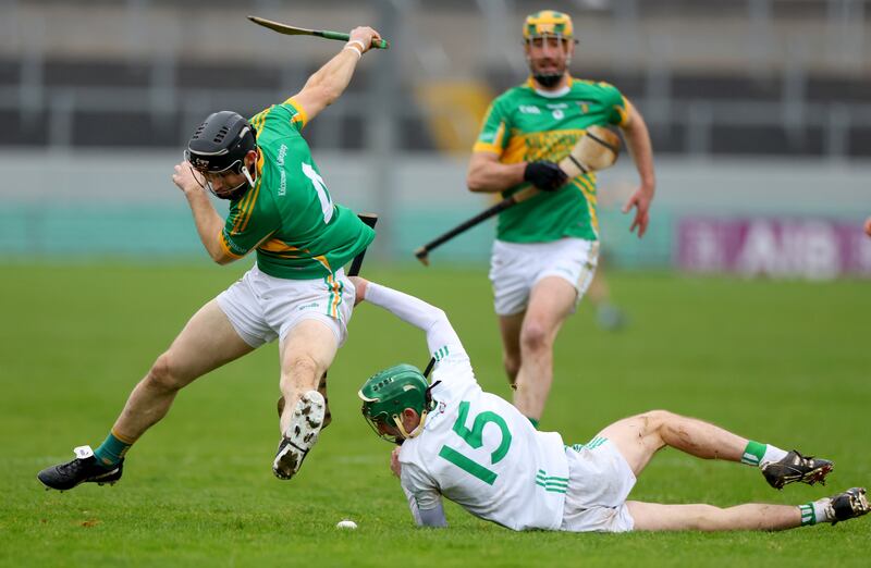 Kilcormac’s Tom Spain and Sean Bolger of O’Loughlin Gaels. Photograph: James Crombie/Inpho