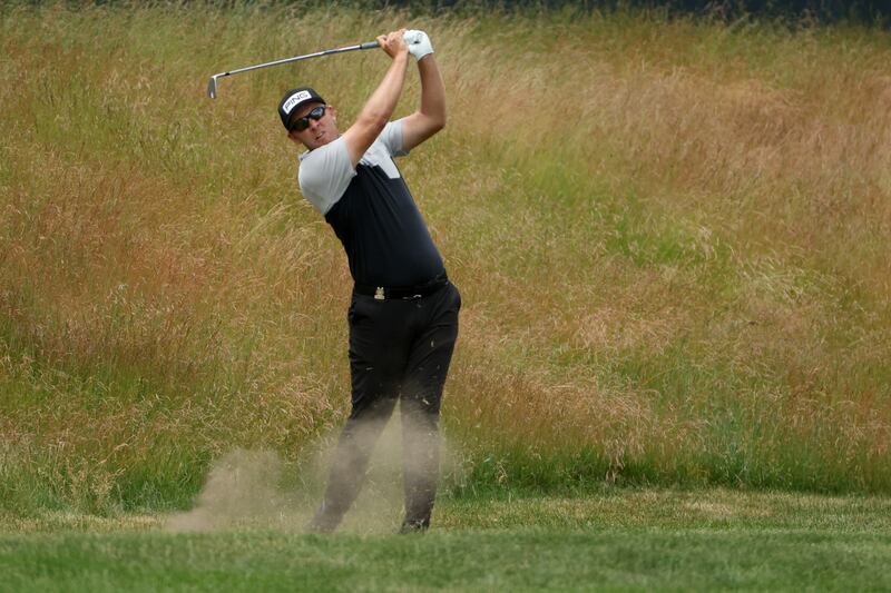 Séamus Power of Ireland plays an approach shot on the first hole during the third round. Photograph: Patrick Smith/Getty