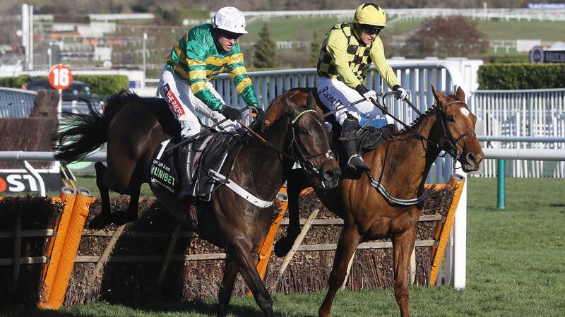Barry Geraghty onboard Buveur D’air (left) comes home to win the 2018 Champion Hurdle  ahead of Paul Townend onMelon. Photograph: James Crombie/Inpho
