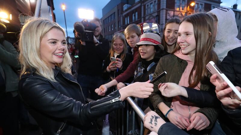 Saoirse-Monica Jackson signs autographs ahead of Derry Girls premiere Photograph: Niall Carson/PA Wire