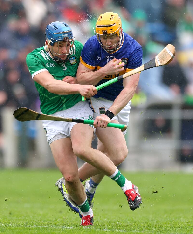 Limerick’s Mike Casey and Jake Morris of Tipperary in action at Semple Stadium on April 20th, 2025. Photograph: James Crombie/Inpho