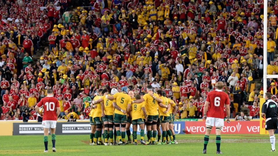 The Wallabies embrace shortly before kick-off. Photograph: Bradley Kanaris/Getty Images