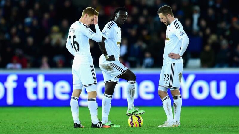 Swansea players  prepare to kick off after going 5-0 down to Chelsea at Liberty Stadium. Photograoh:  Stu Forster/Getty Images