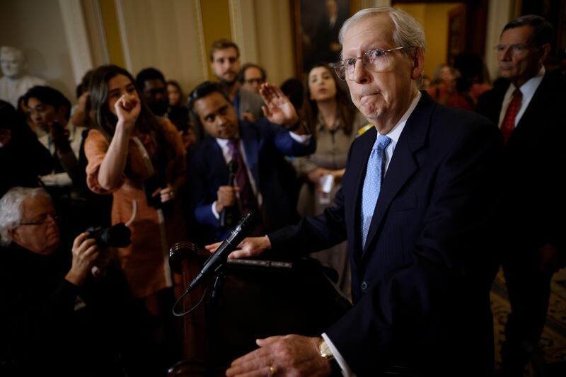 Senate Minority Leader Mitch McConnell (front) talks to reporters after  senators met after Speaker of the House Kevin McCarthy was ousted. Photograph: Getty 