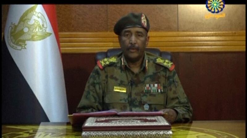 Gen Abdel-Fattah Burhan, head of the Sudanese Transitional Military Council, makes a broadcast announcement on Tuesday, in which he said the military would unilaterally form an interim government and hold snap elections. Photograph: Sudan TV via AP