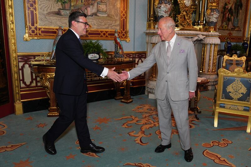 King Charles shakes hands with incoming prime minister Andy Burnham, during an audience at Buckingham Palace, London. Photograph: Aaron Chown/AFP via Getty Images