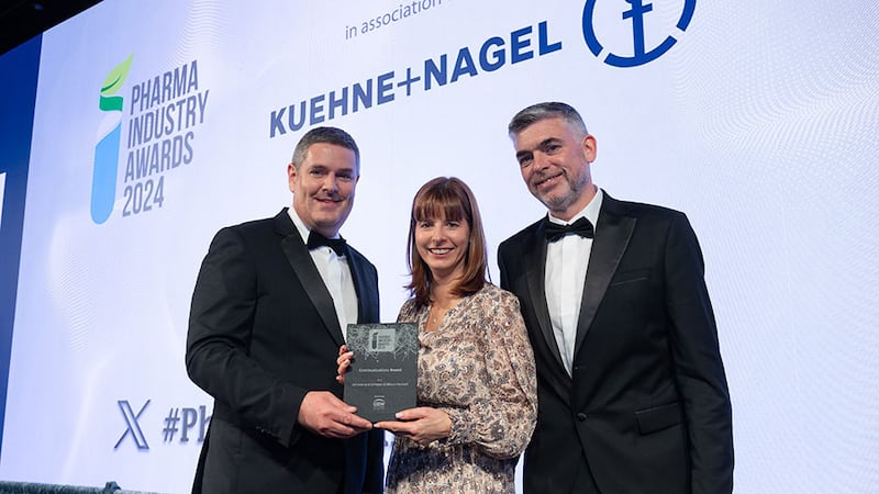 JJ O'Brien, managing director of OBW Technologies, presents the communications award to Carmel Mulroy and Liam Morris, Johnson and Johnson & Wilson Hartnell