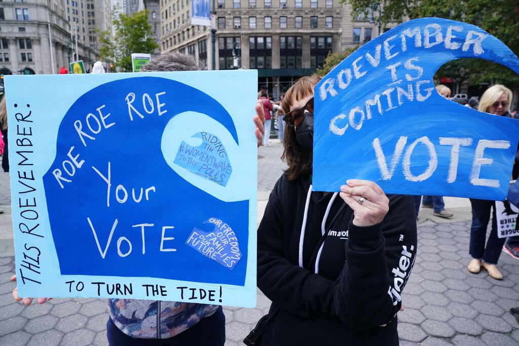Demonstrators hold signs during a rally in New York earlier this month to defend abortion access and codify Roe v Wade into law. Photograph: Bryan R Smith/AFP via Getty Images