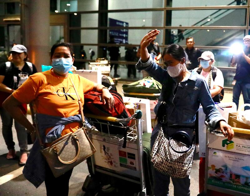 Filipino migrant workers evacuated from Israel arrive at Manila's international airport on October 23rd, 2023. Photograph: EPA-EFE