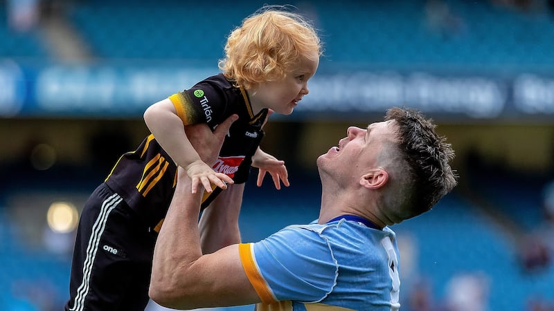 Kilkenny's TJ Reid with his daughter Harper after the semi-final loss to Tipperary - hopefully we see him back in action for Kilkenny again next year. Photograph: Tom O’Hanlon/Inpho