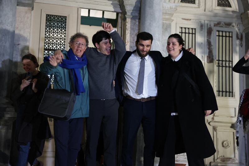 Seán Binder (second left), Pieter Wittenberg, Nasos Karakitsos and Sarah Mardini leave the courthouse in Mytilene on the Greek island of Lesbos on Thursday. Photograph: Manolis Lagoutaris/AFP/Getty