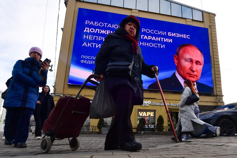 Image of Vladimir Putin in St Petersburg: Presidential elections will run over three days from Friday.  Photograph: Olga Maltseva/AFP via Getty Images