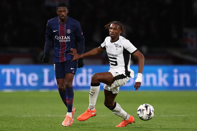 Paris Saint-Germain's Ousmane Dembele and Rennes' defender Jeremy Jacquet fight for the ball. Photograph: Franck Fife/AFP via Getty