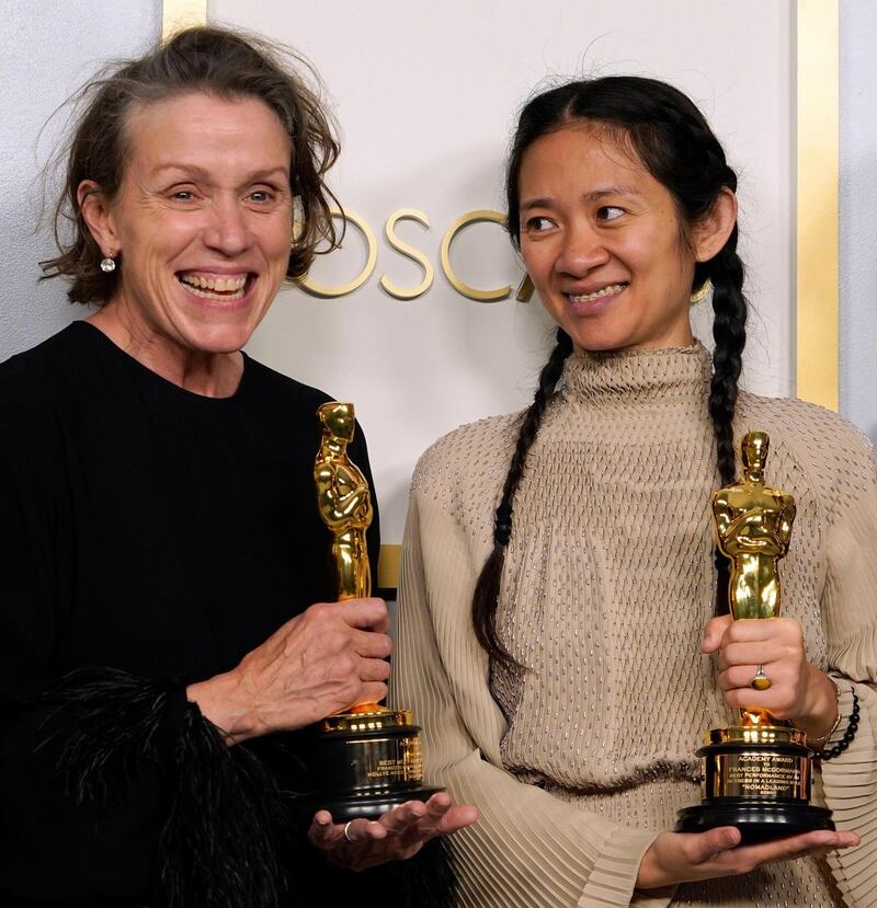 Producers Frances McDormand, left, and Chloe Zhao, winners of the award for best picture for "Nomadland," pose in the press room at the Oscars on Sunday, April 25, 2021, at Union Station in Los Angeles. (AP Photo/Chris Pizzello, Pool)