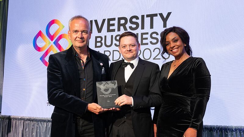Mark Fenton, awards judge, presents the diversity, equality & inclusion award - retail to Donal Ormsby and Trudi Gulzar, B&Q