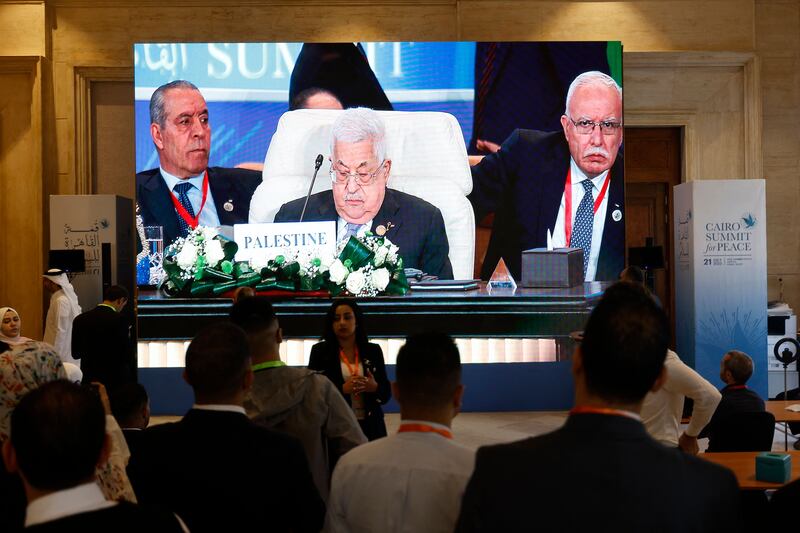 Palestinian president Mahmoud Abbas is pictured on a large screen as he attends the International Peace Summit hosted by the Egyptian president in Cairo on Saturday. Photograph: KHALED DESOUKI/AFP via Getty Images