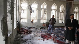 Dozens killed in suicide bombing at mosque in Kabul