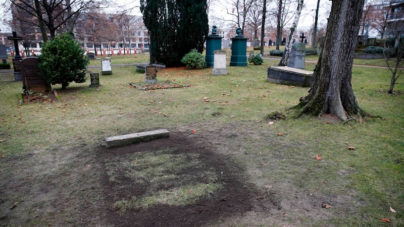 The grave of a top Nazi who helped plan the Holocaust and was assassinated by British-trained agents during World War II has been dug up in the night .  Photograph: Odd Andersen/AFP via Getty Images