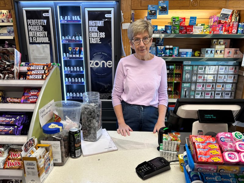 Anne Swaine behind the counter at The Bus Stop Shop, Enniscorthy. Photograph: James Cox