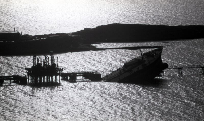 The Whiddy Island oil terminal disaster happened in Bantry Bay, west Cork, in the early hours of January 8th, 1979. Fifty people died after a fire and explosion on the French tanker Betelgeuse, berthed at the Gulf Oil terminal on the island.  Photograph: Paddy Whelan