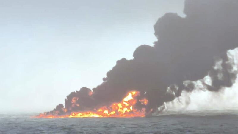Smoke billowing into the air after a crash between an oil tanker and a cargo ship off the coast of east Yorkshire. Photograph: Bartek Smialek/PA