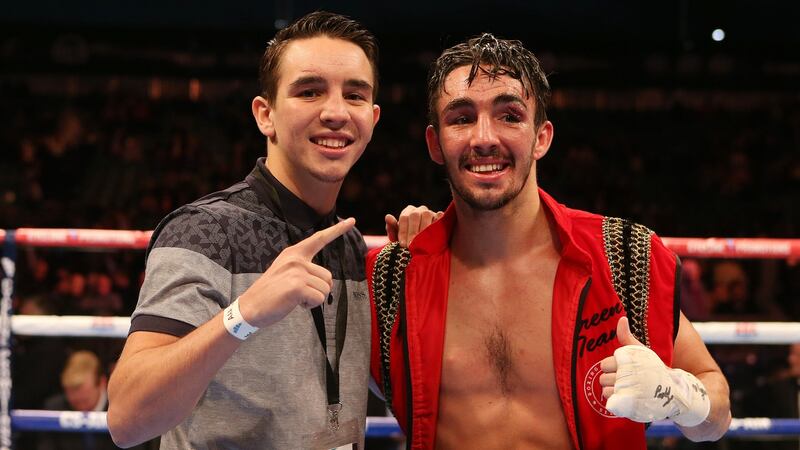 Michael Conlan celebrates with his brother Jamie after he beat Jose Estrella in 2014. Photograph: Matt Mackey/InphoIe