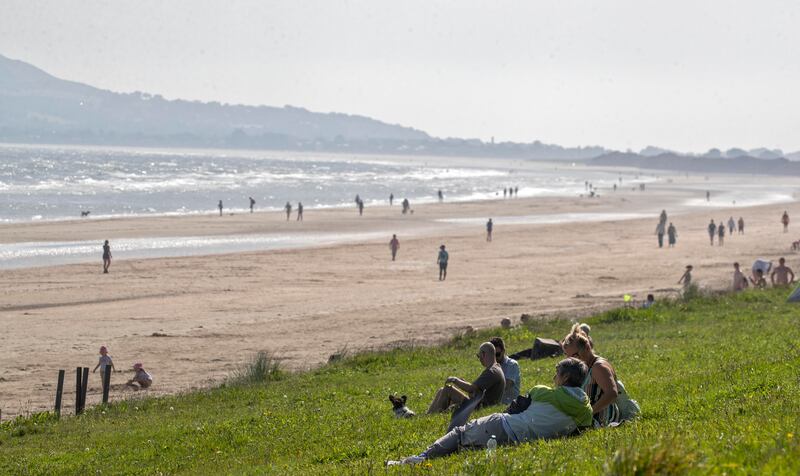 People enjoy the good weather at Portmarnock. Photograph: Colin Keegan/Collins Dublin