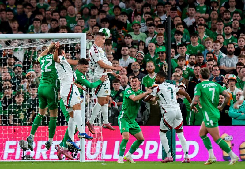 Roland Sallai rises highest to score Hungary's second goal. Photograph: Ryan Byrne/Inpho
