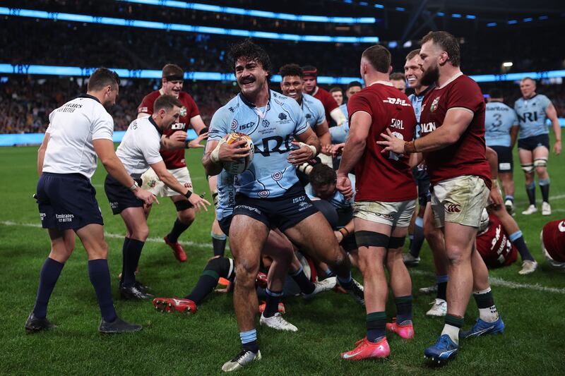 Charlie Gamble of the Waratahs celebrates scoring a try during the tour match against the Lions. Photograph: Cameron Spencer/Getty