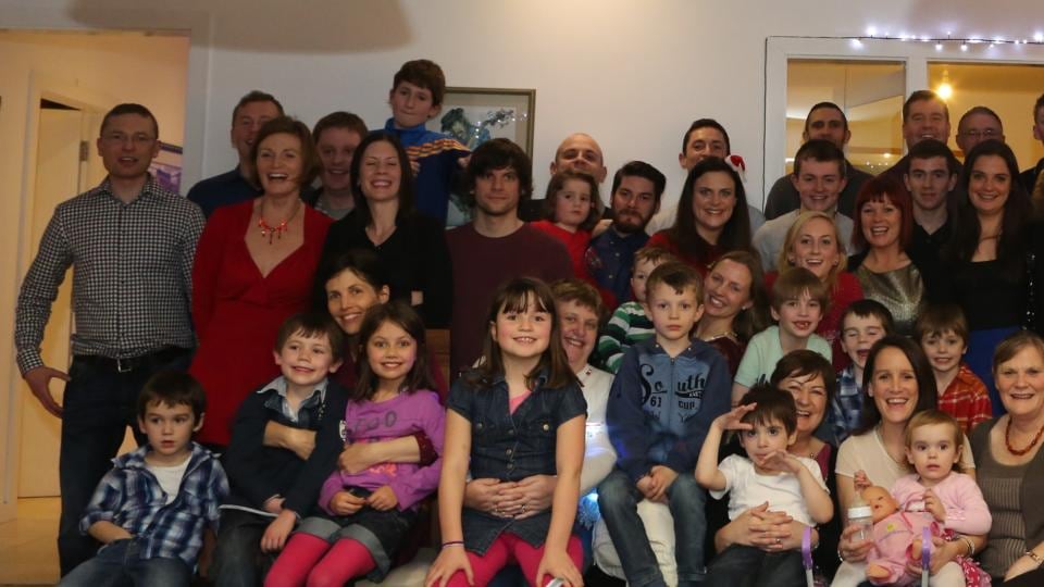 Jane Walsh (far left, red dress) will have 70 of the extended Kenny clan for Christmas this year, a tradition her grandparents started. Photograph: Karen Golden